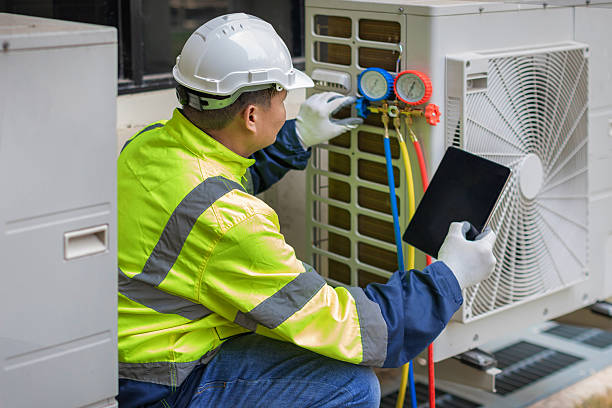 Professional Air Conditioning Repair technician working in Staples, TX